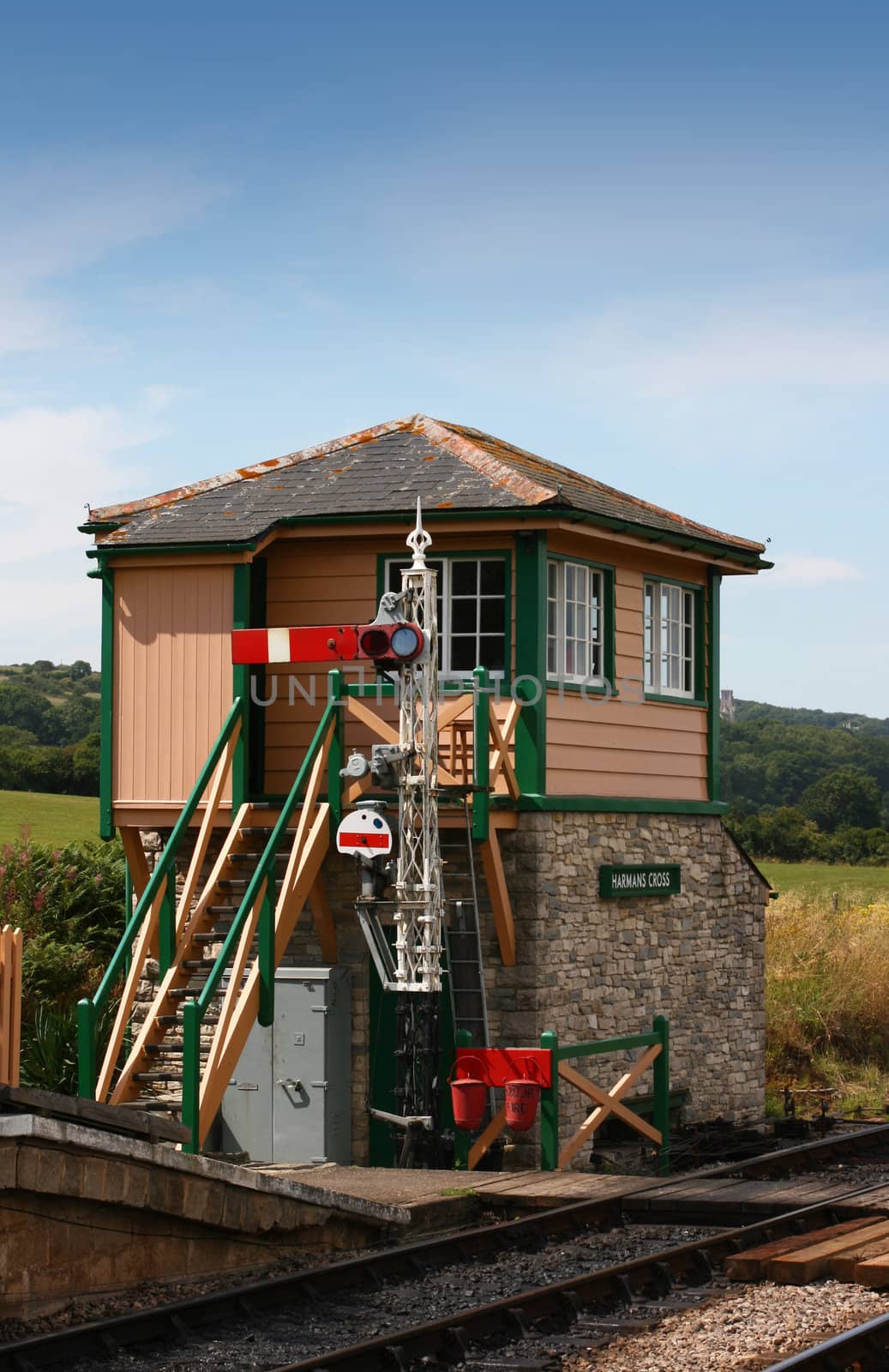 The signal box at Harmans Cross Station, part of the Swanage steam railway network in Dorset.  located at the end of the station platform.