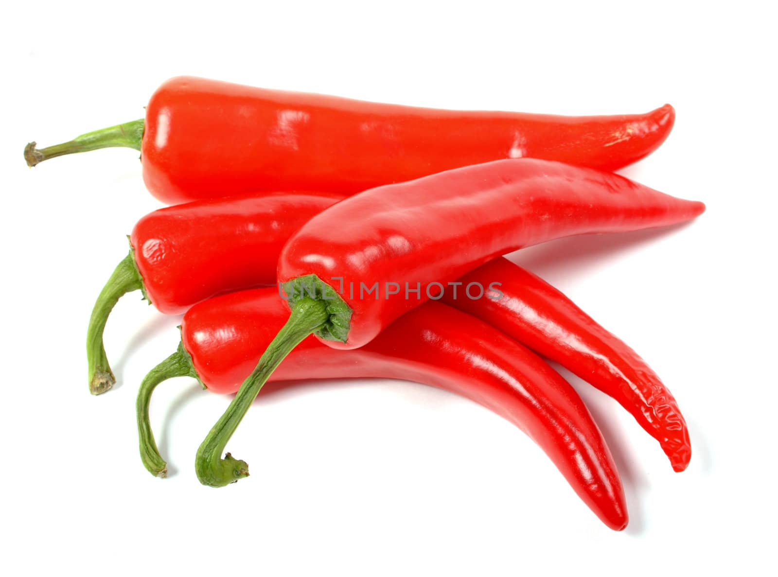 big red hot chili peppers isolated over white