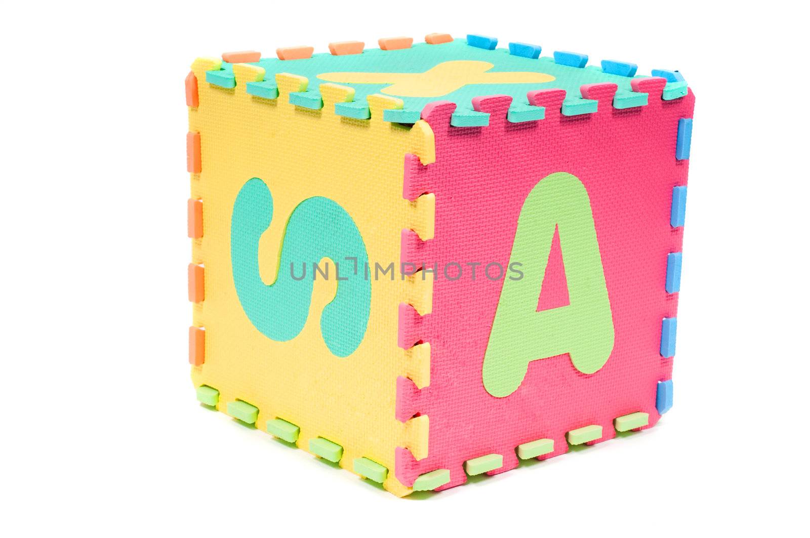 Studio shot of big cube with letters isolated on white