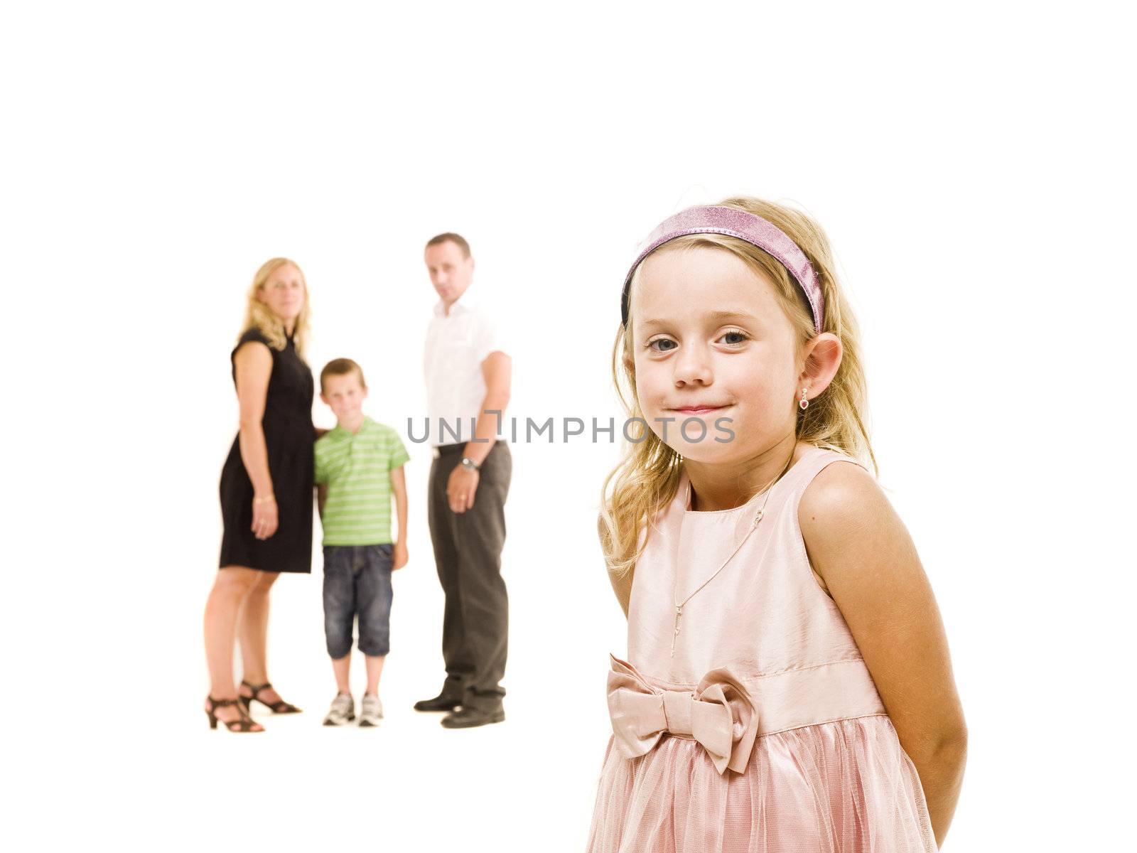Young Girl in front of her family isolated on white background