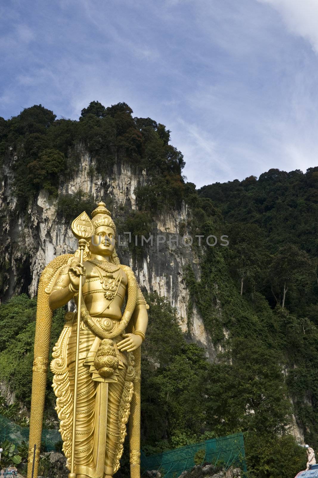 Golden statue at Batu Caves Malaysia, a religion and tourist spot.