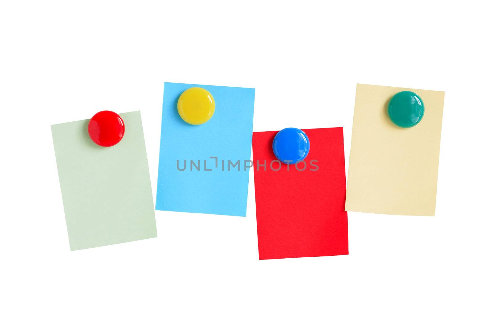 Few colored paper sheets hanging with magnets on white background. Clipping path included