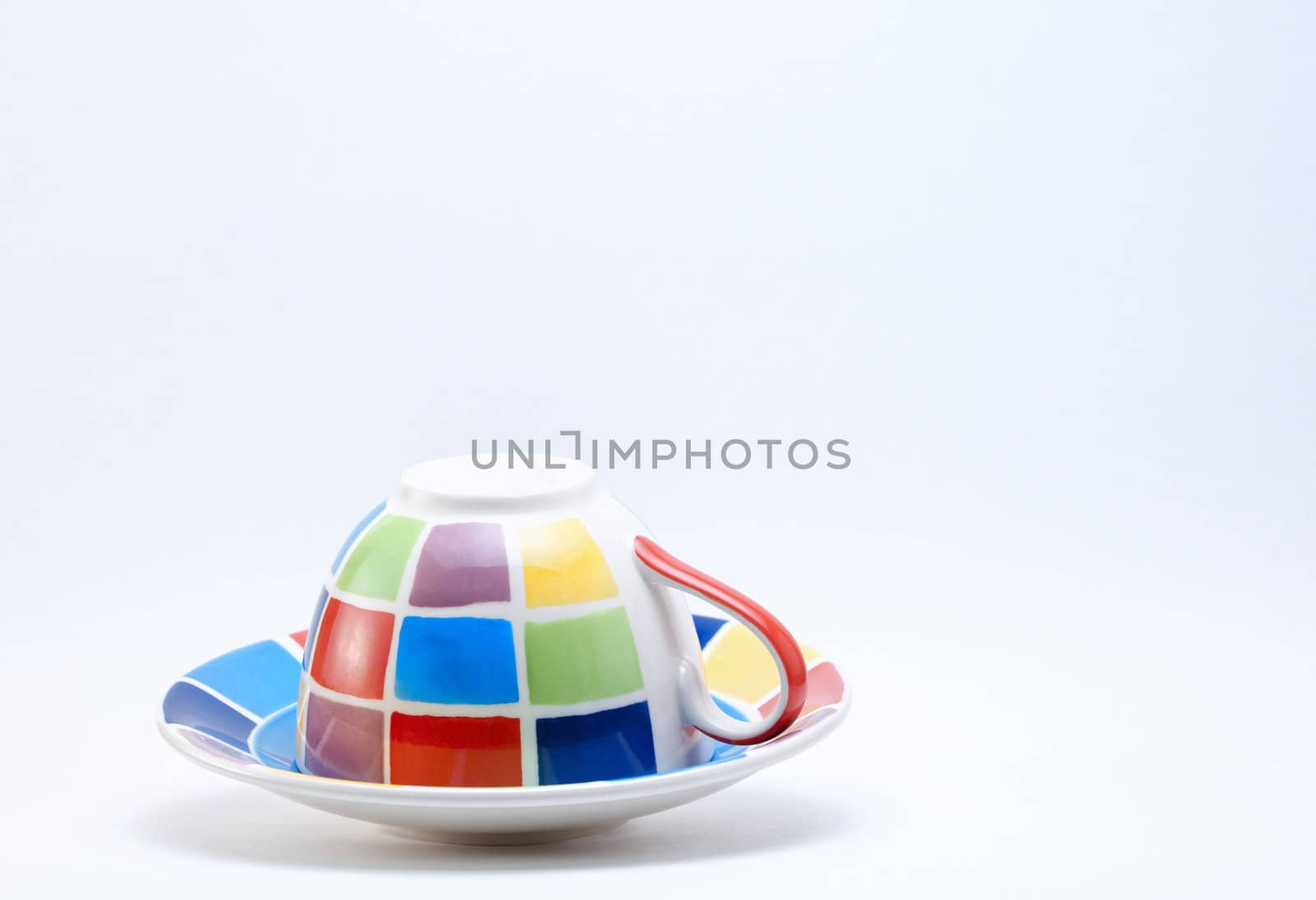 Colourful Checkered Cup on a White Background.