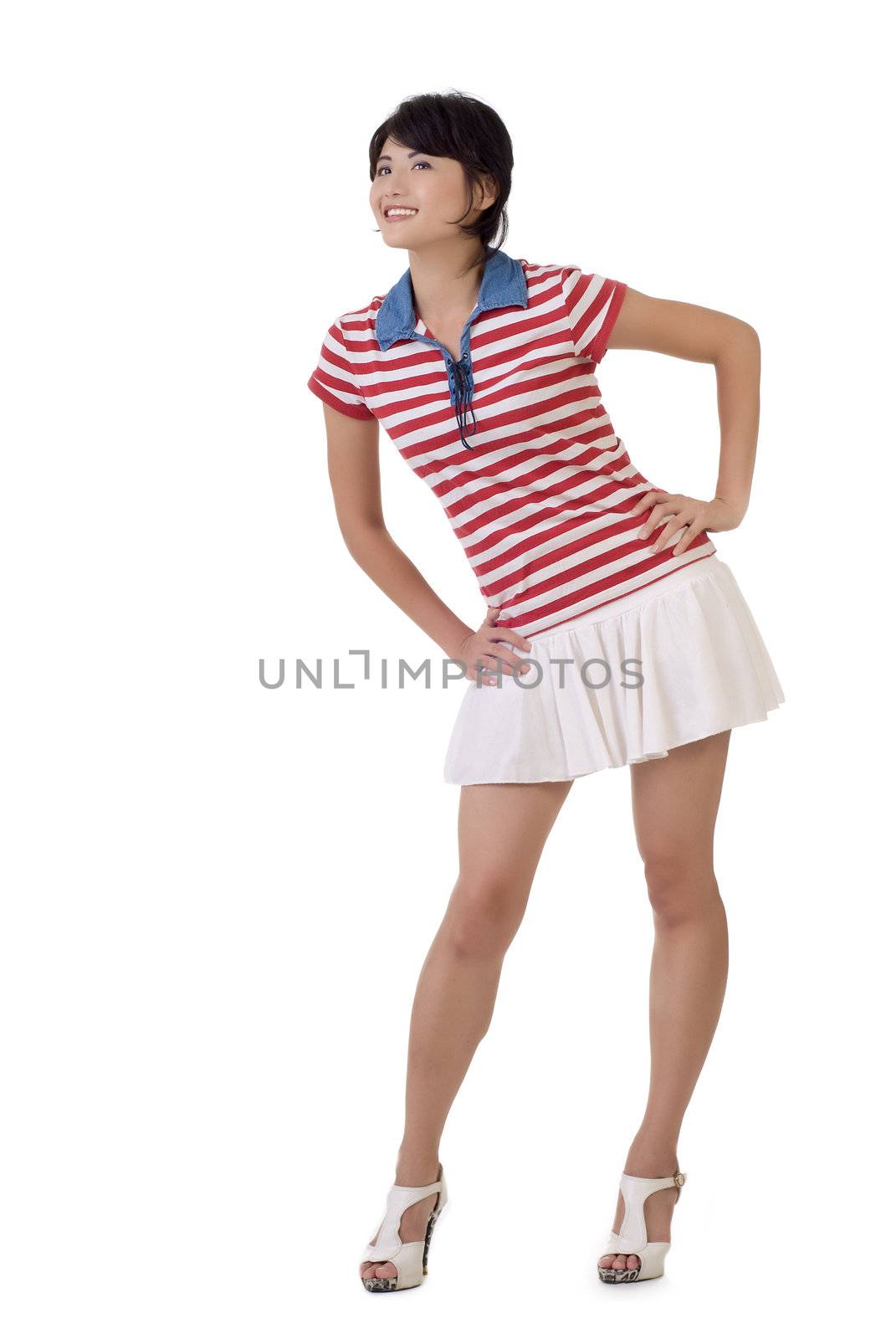 Happy young girl of Asian posing, full length portrait isolated on white background.