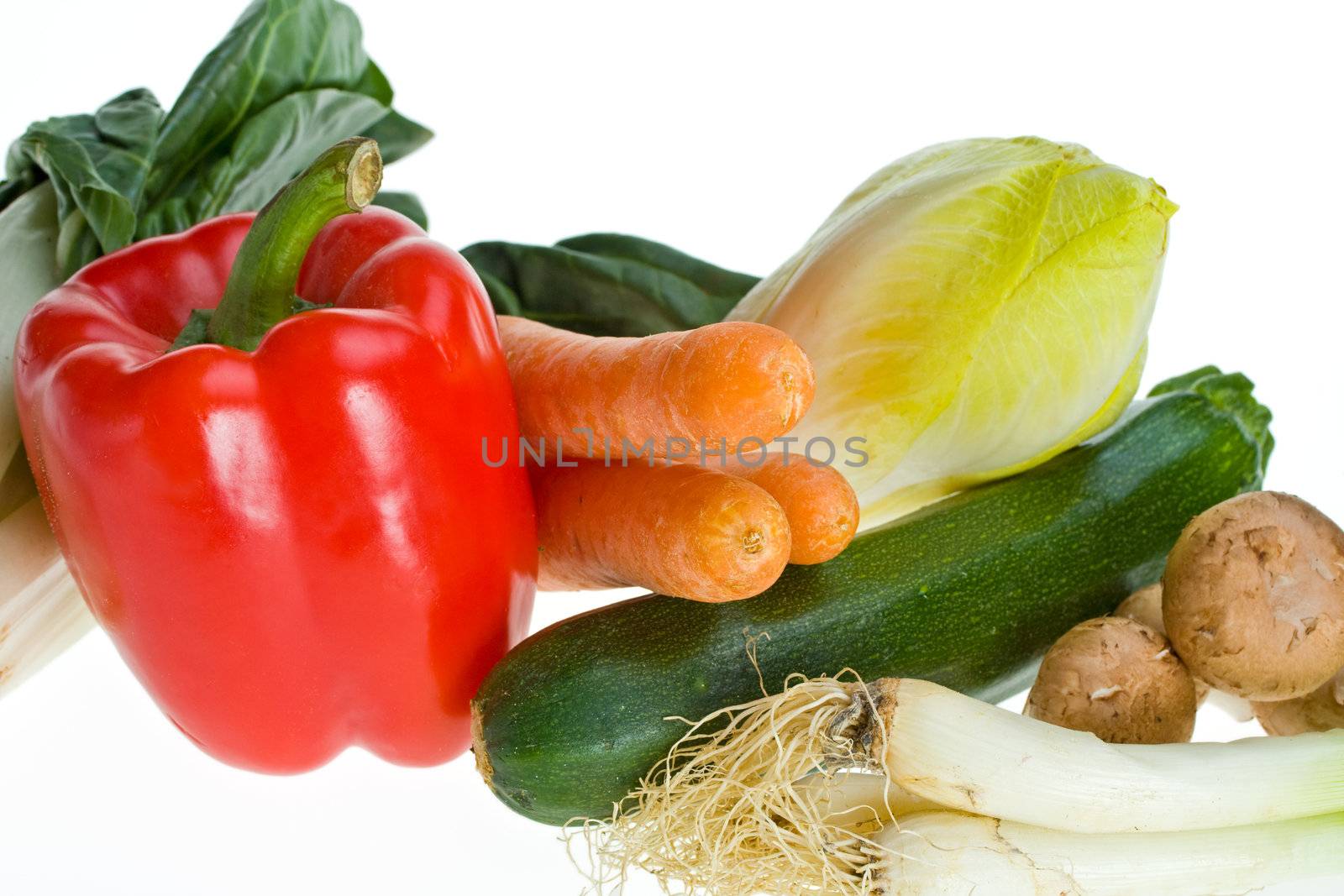 vegetables isolated on a white background by bernjuer