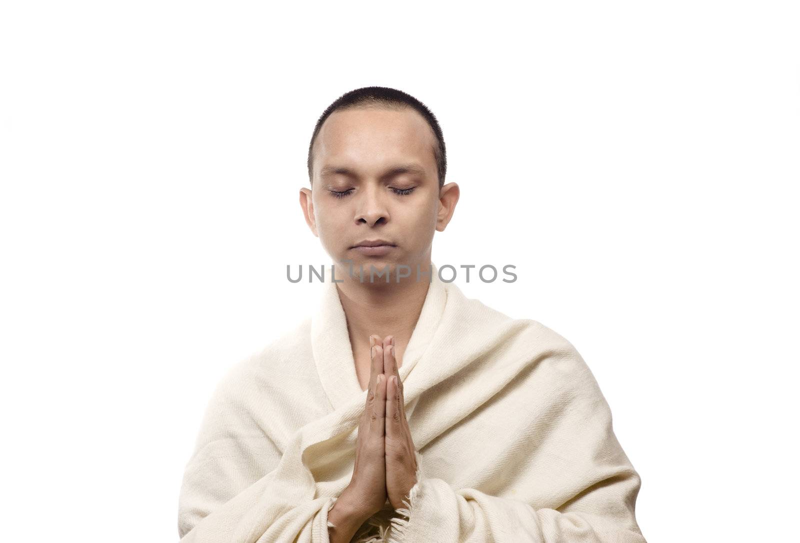 Man looking just like monk with hands in the position of regards