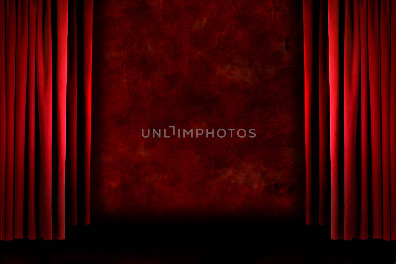 Red old fashioned grungy elegant theater stage curtain drapes