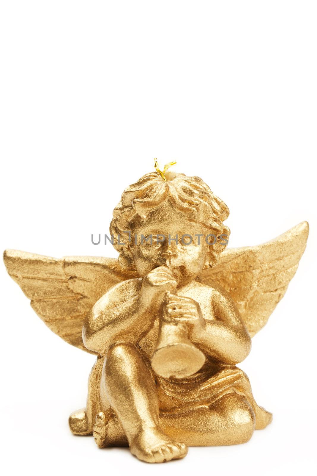 golden christmas figurine with trumpet on white background