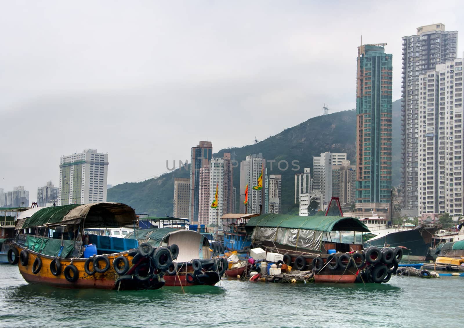 Hong Kong Harbor: sampans. by Claudine
