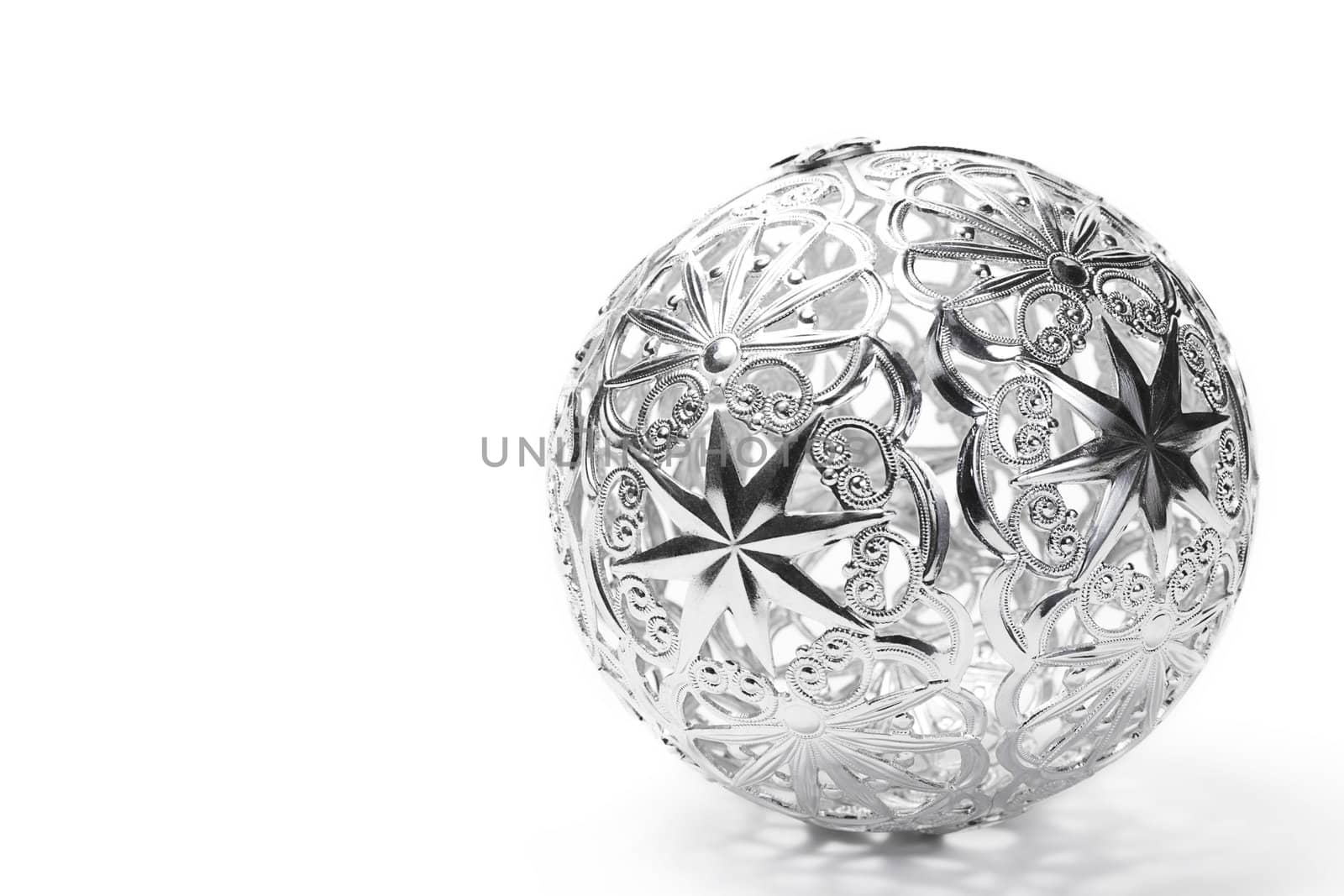 metal christmas ball on white background