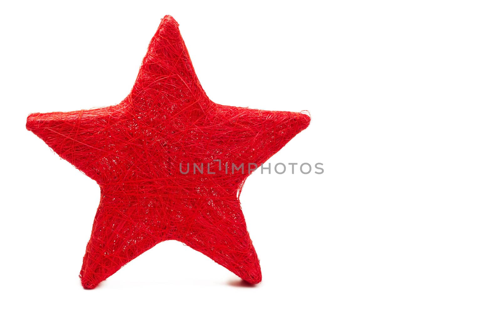 one red thread made star on white background