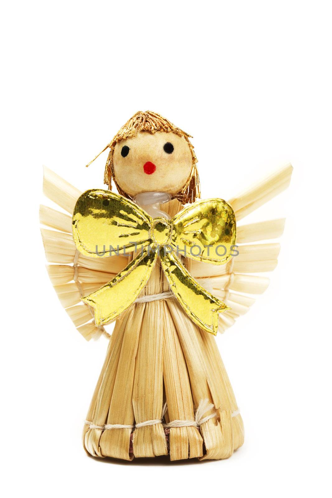 straw christmas angel figurine on white background
