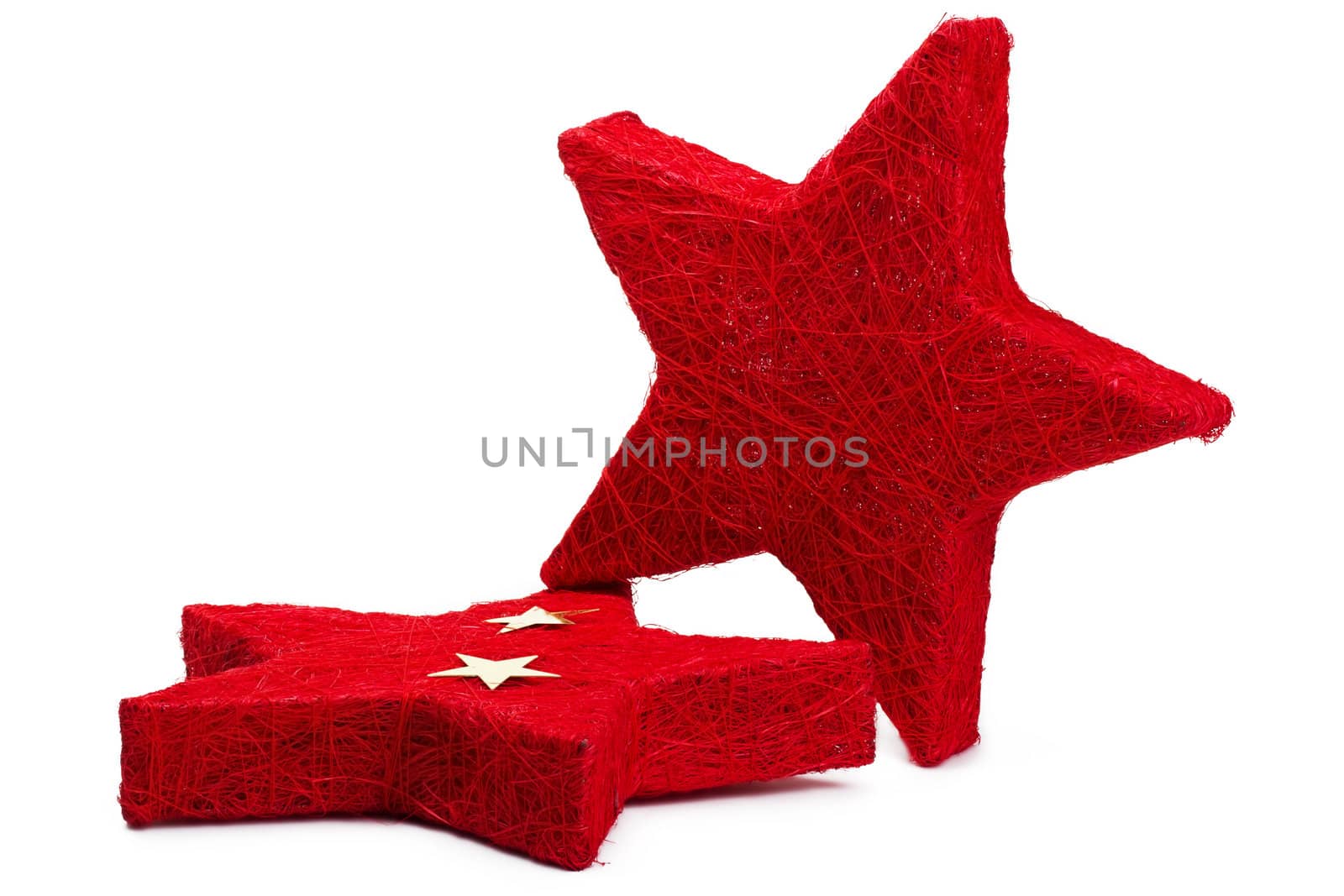 two red thread stars, one lies, on white background