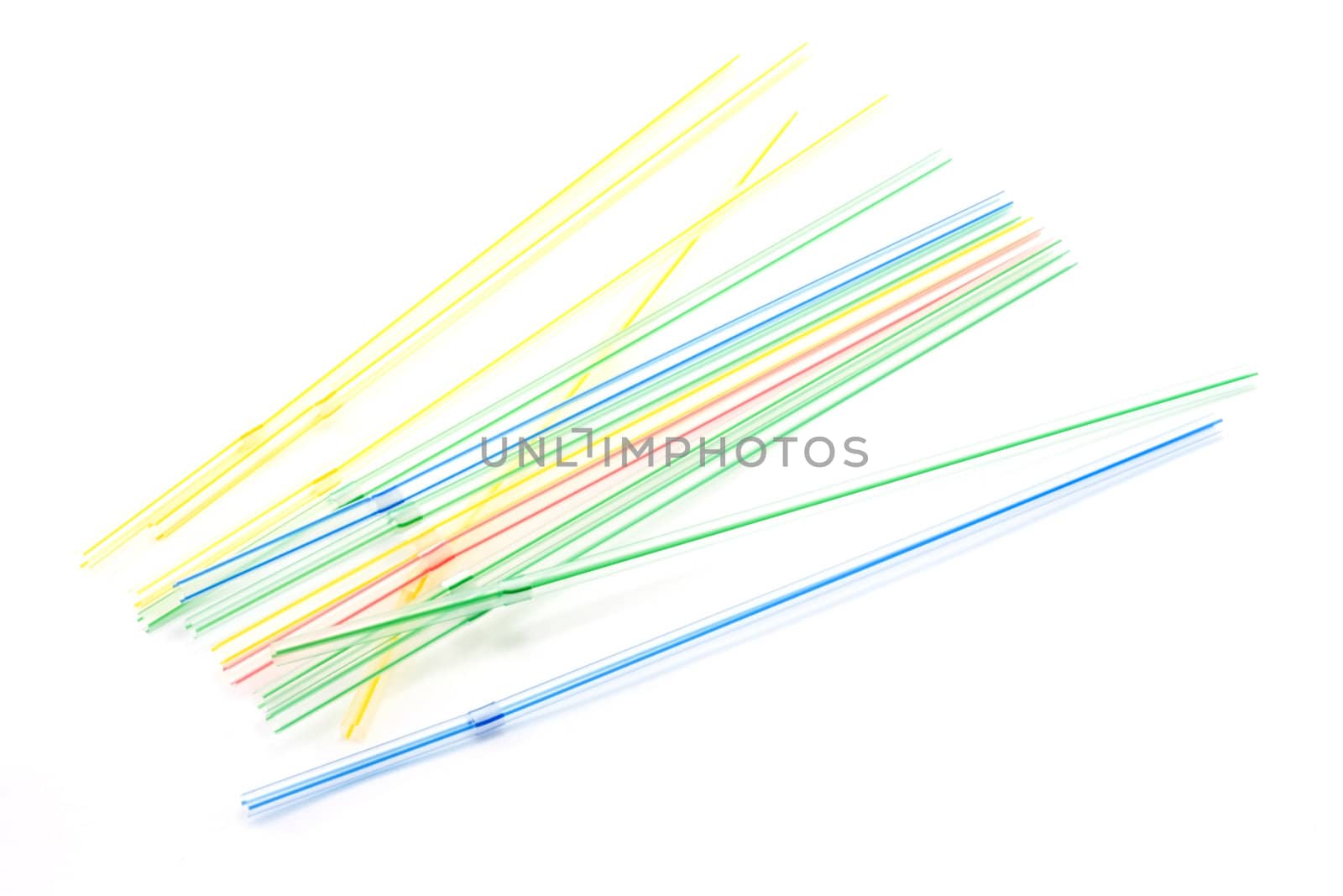 Plastic straws for cocktail on white background