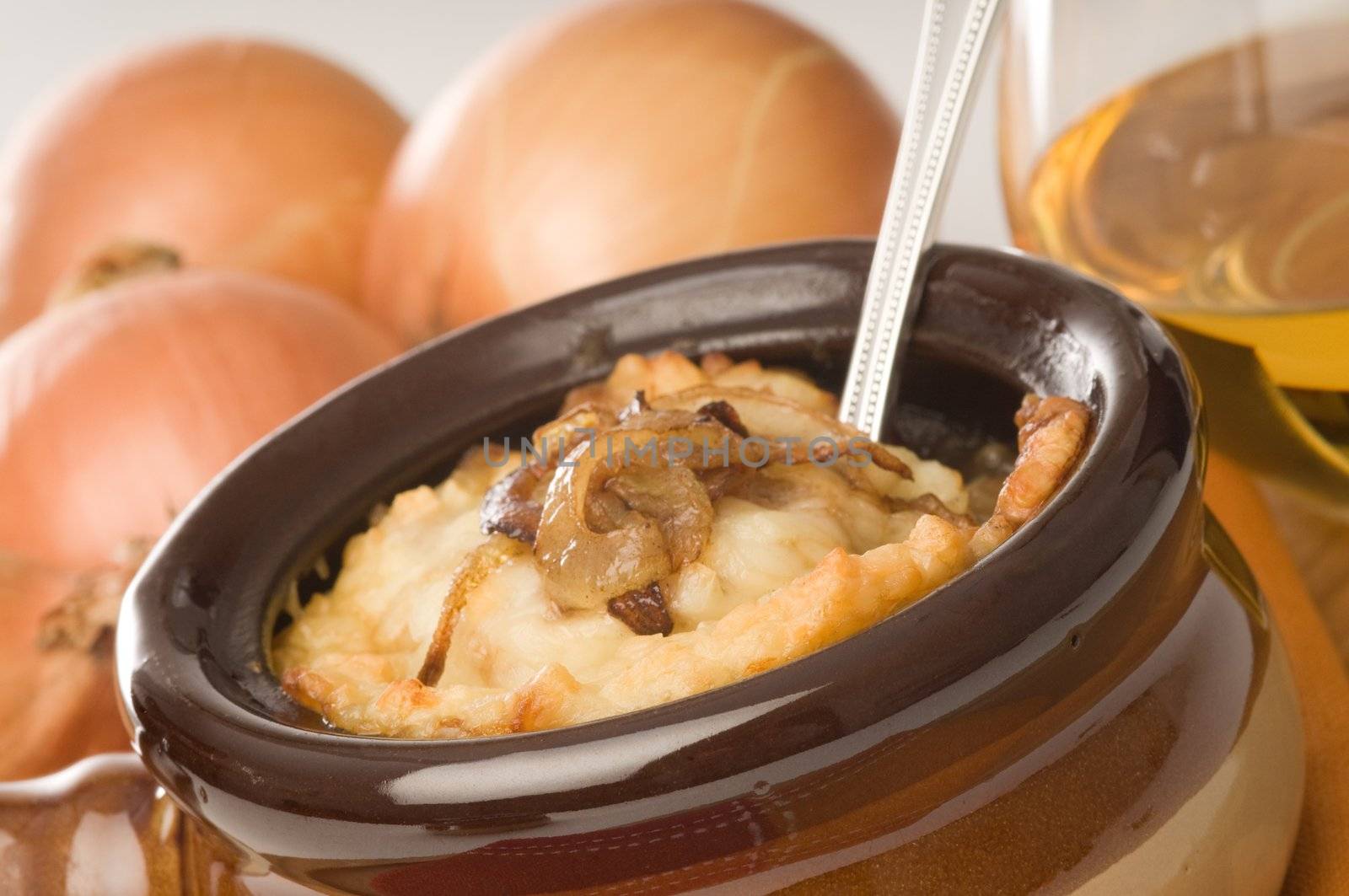 Ceramic bowl of homemade french onion soup.