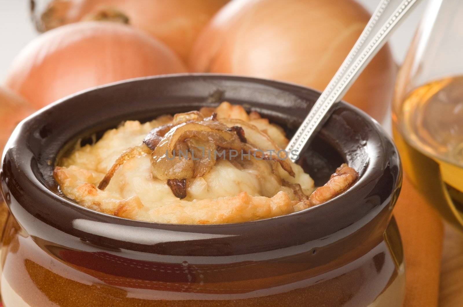 Closeup of bowl of homemade french onion soup.