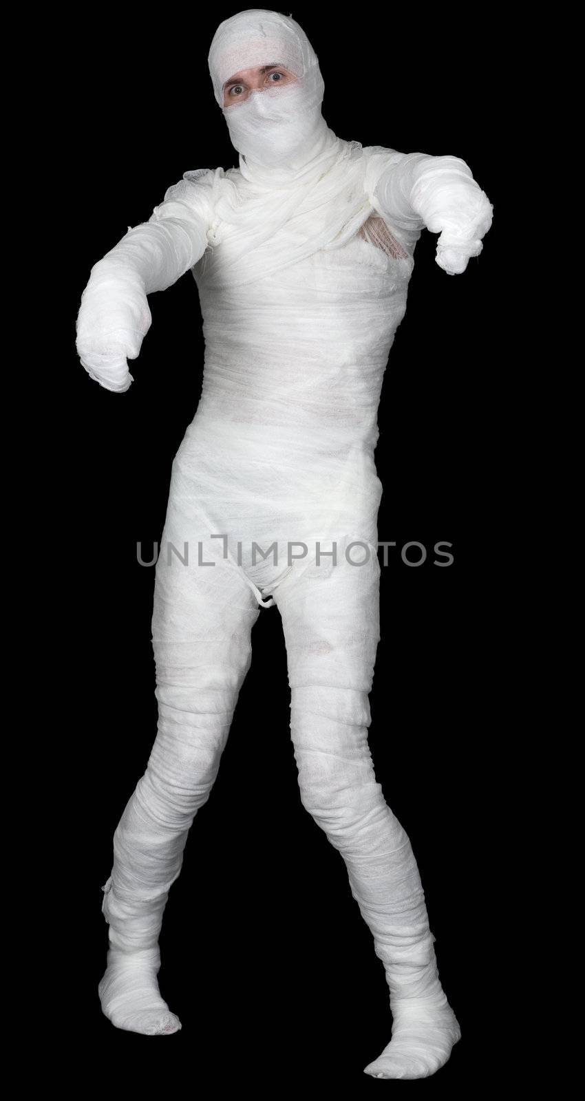 Man in bandage on the black background