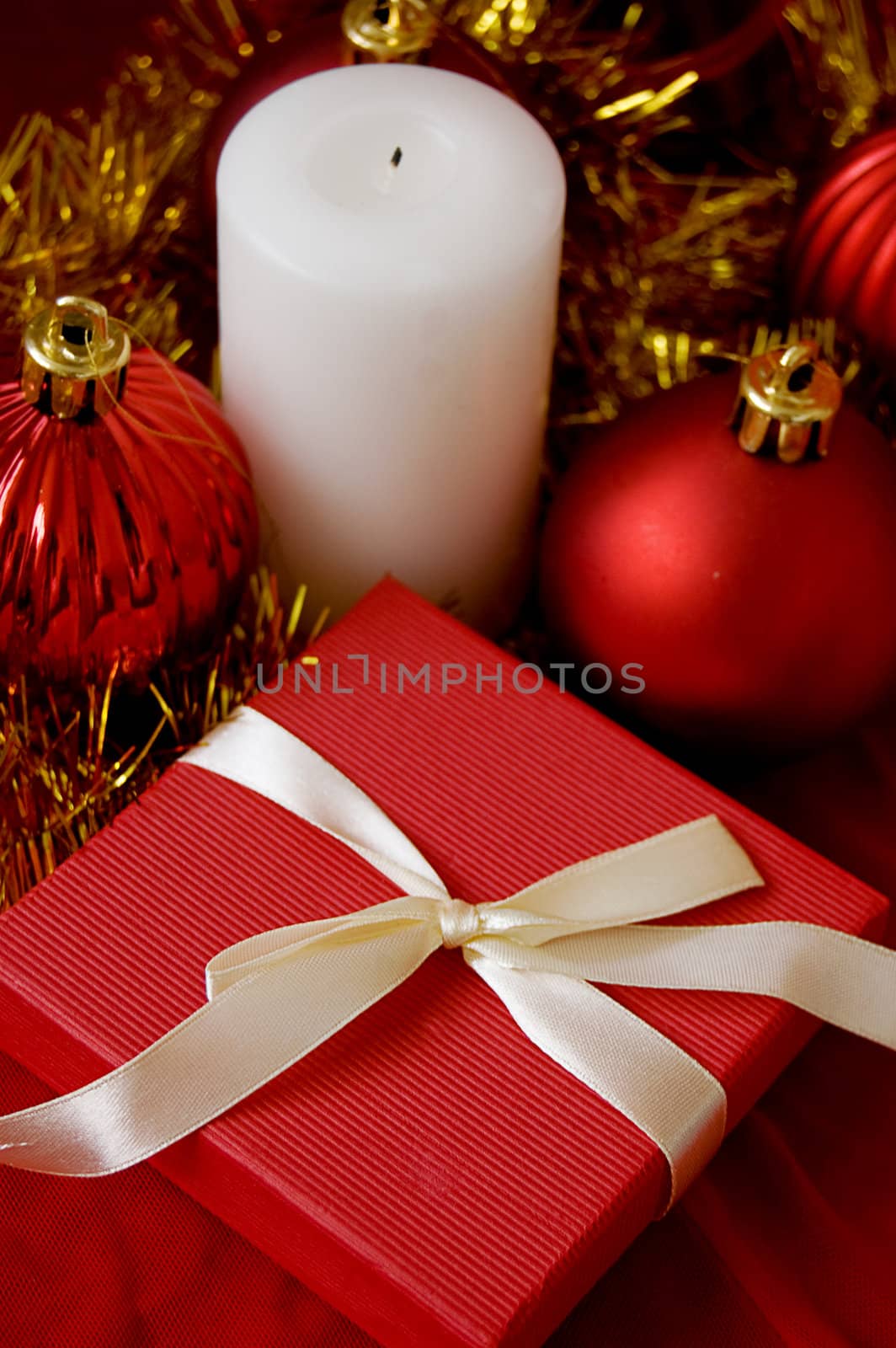 Red gift box over Christmas background