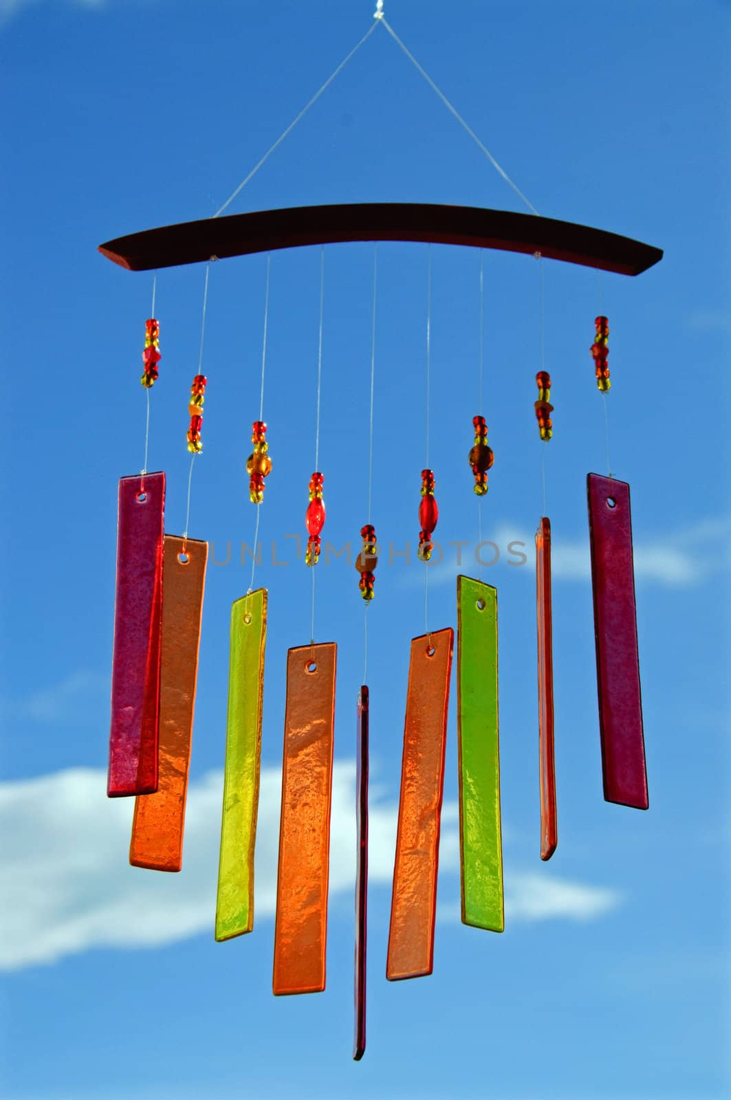 A wind chimes made of glass, pearls and vivid colours