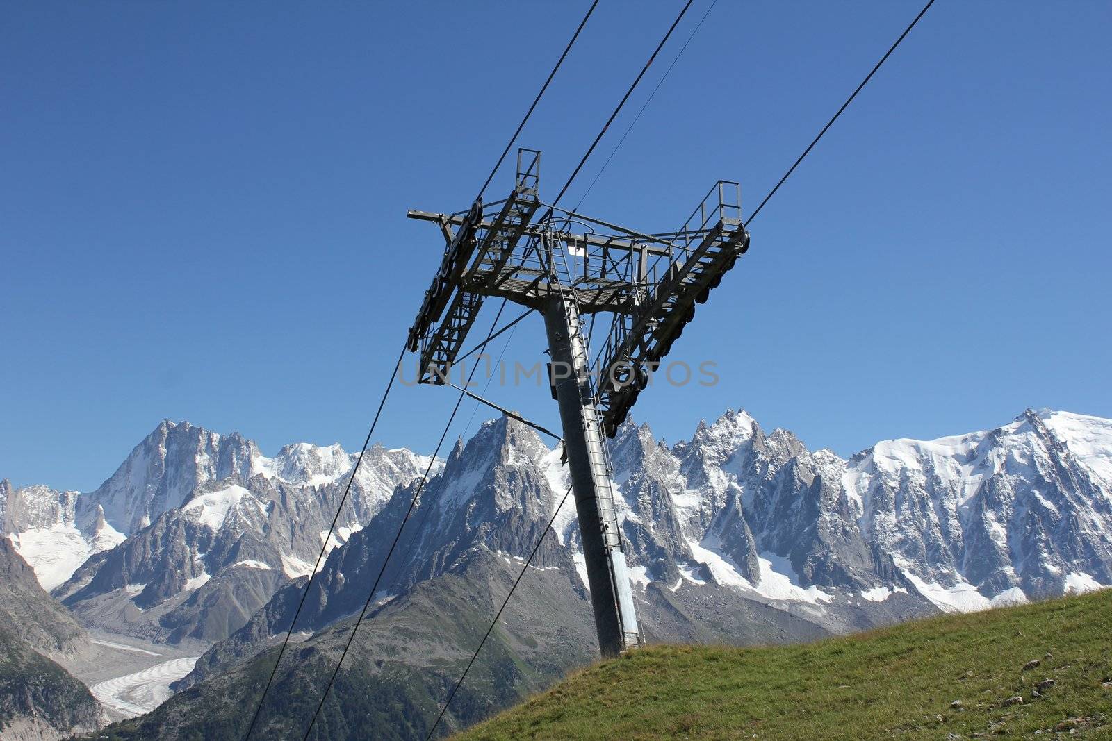 chair lift and mountain and snow white