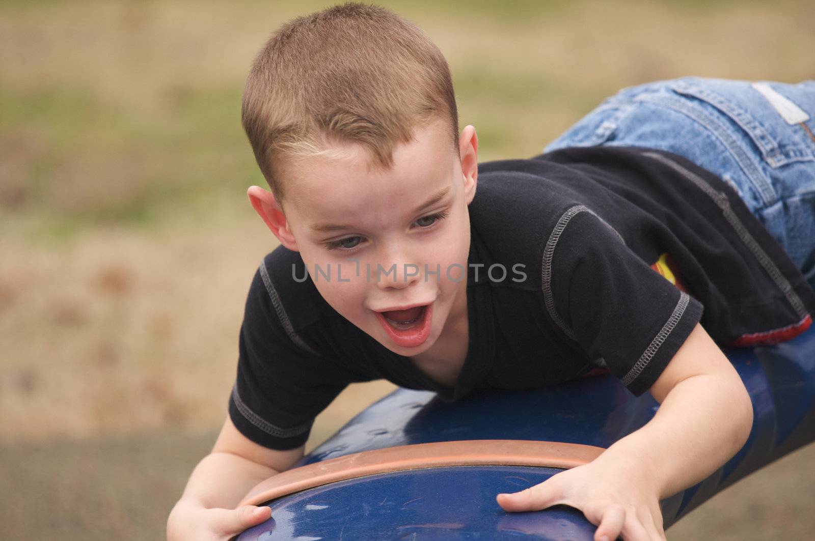 Adorable Child Having Fun Playing at the Playground