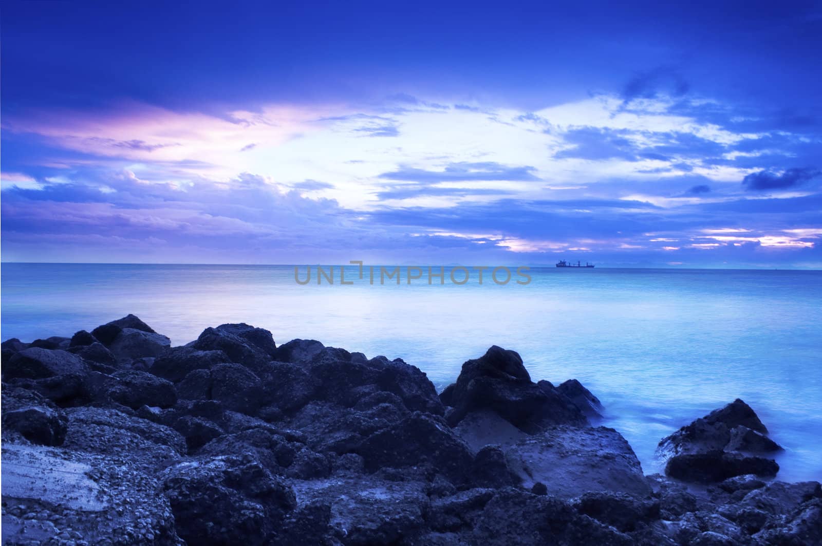 sunset in the sea with blue color