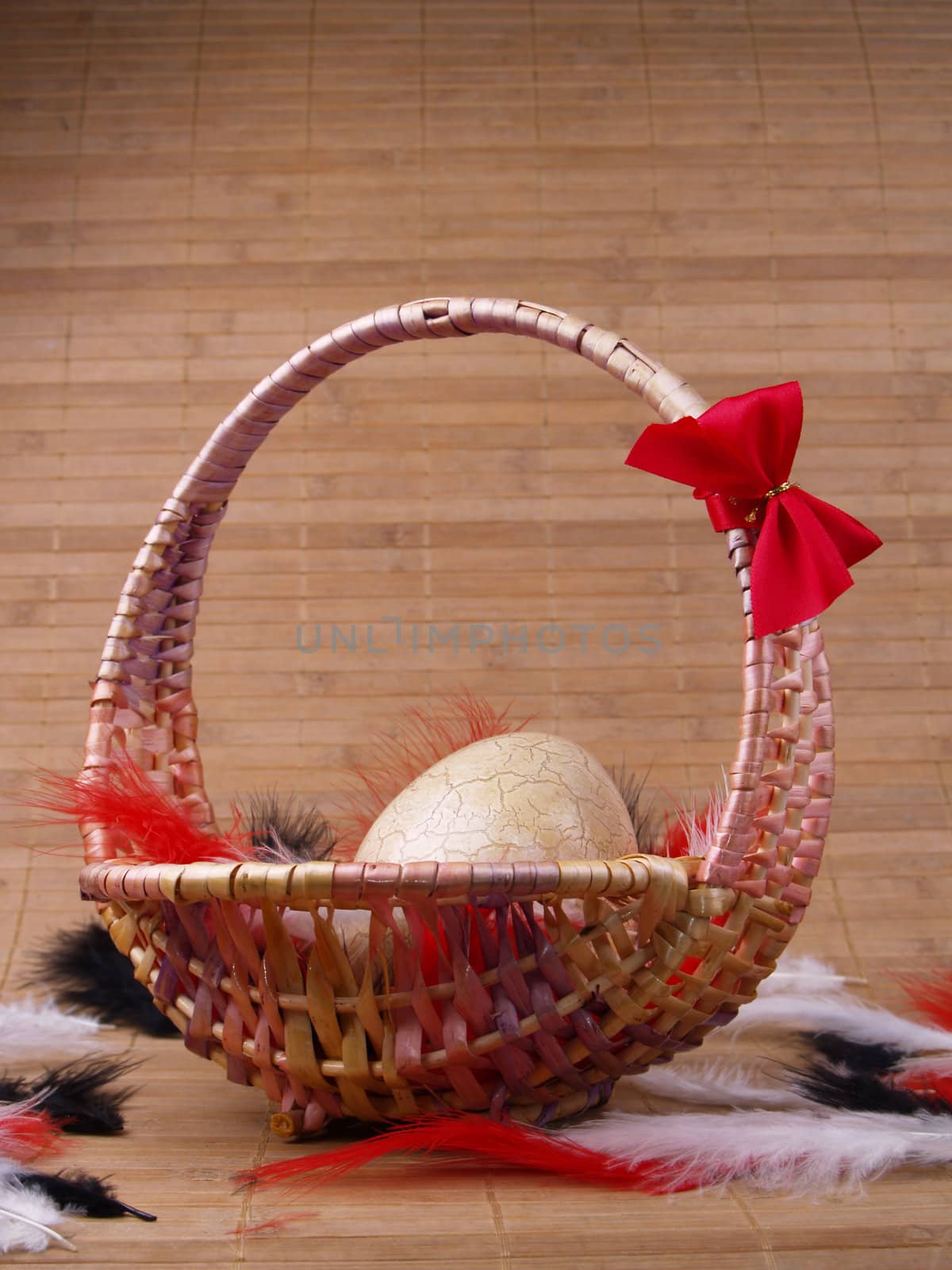 easter basket with egg on tatami style matting