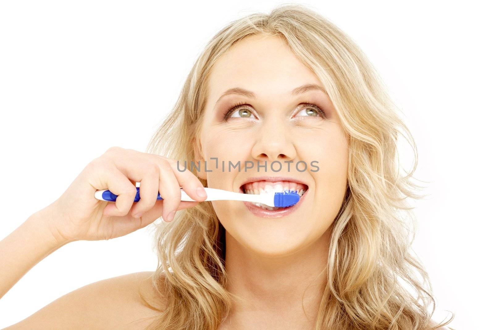 picture of happy blond with toothbrush over white