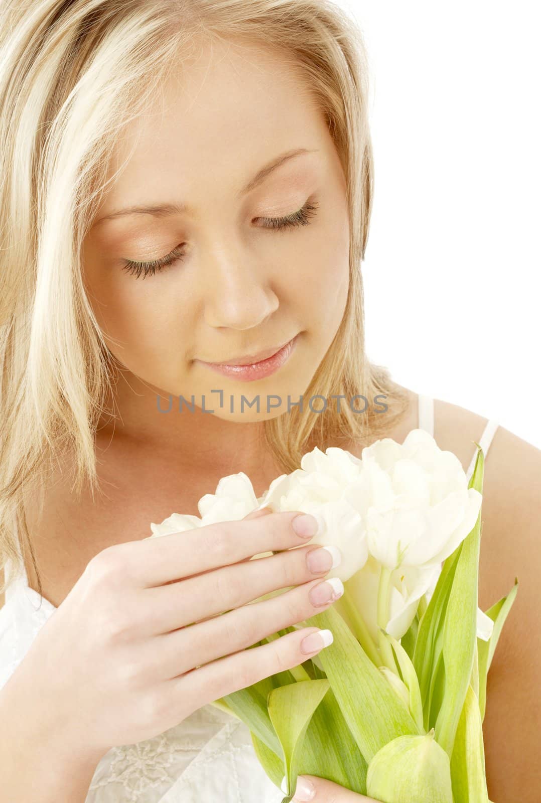 picture of lovely blond with white tulips