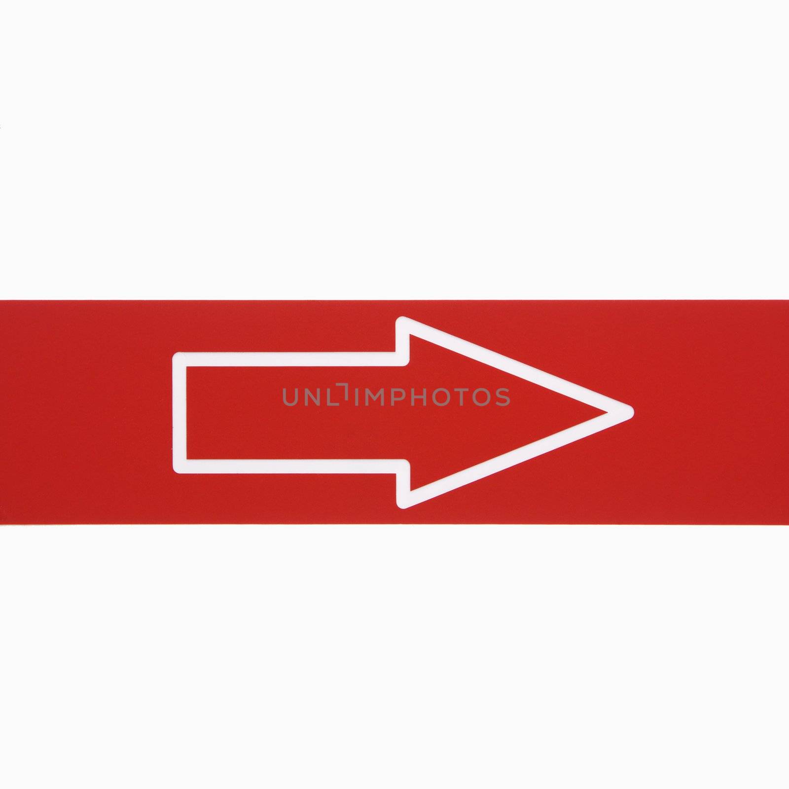 Red sign with arrow against white background.