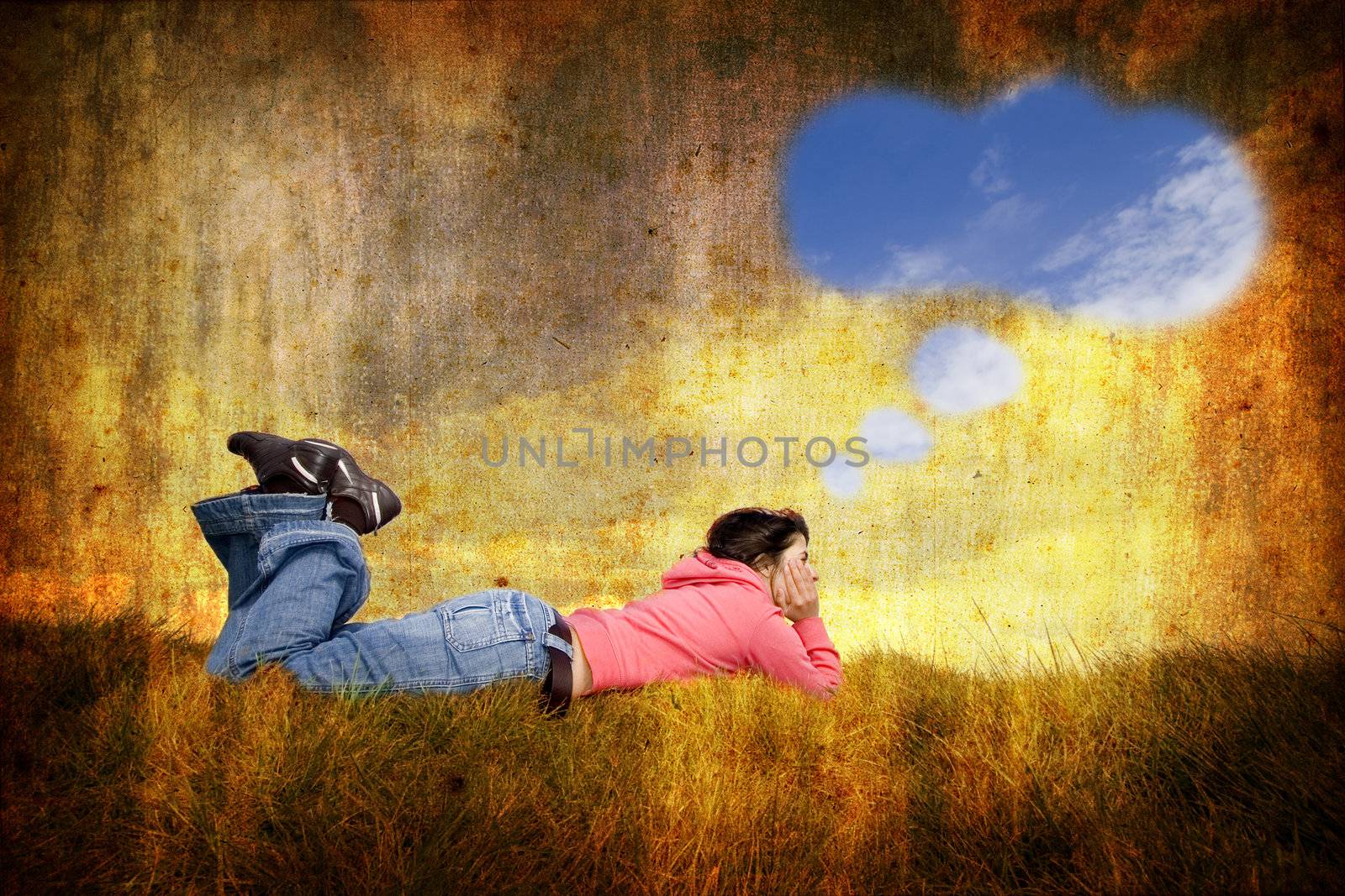 young woman lying in grass with speach balloon by mlopes