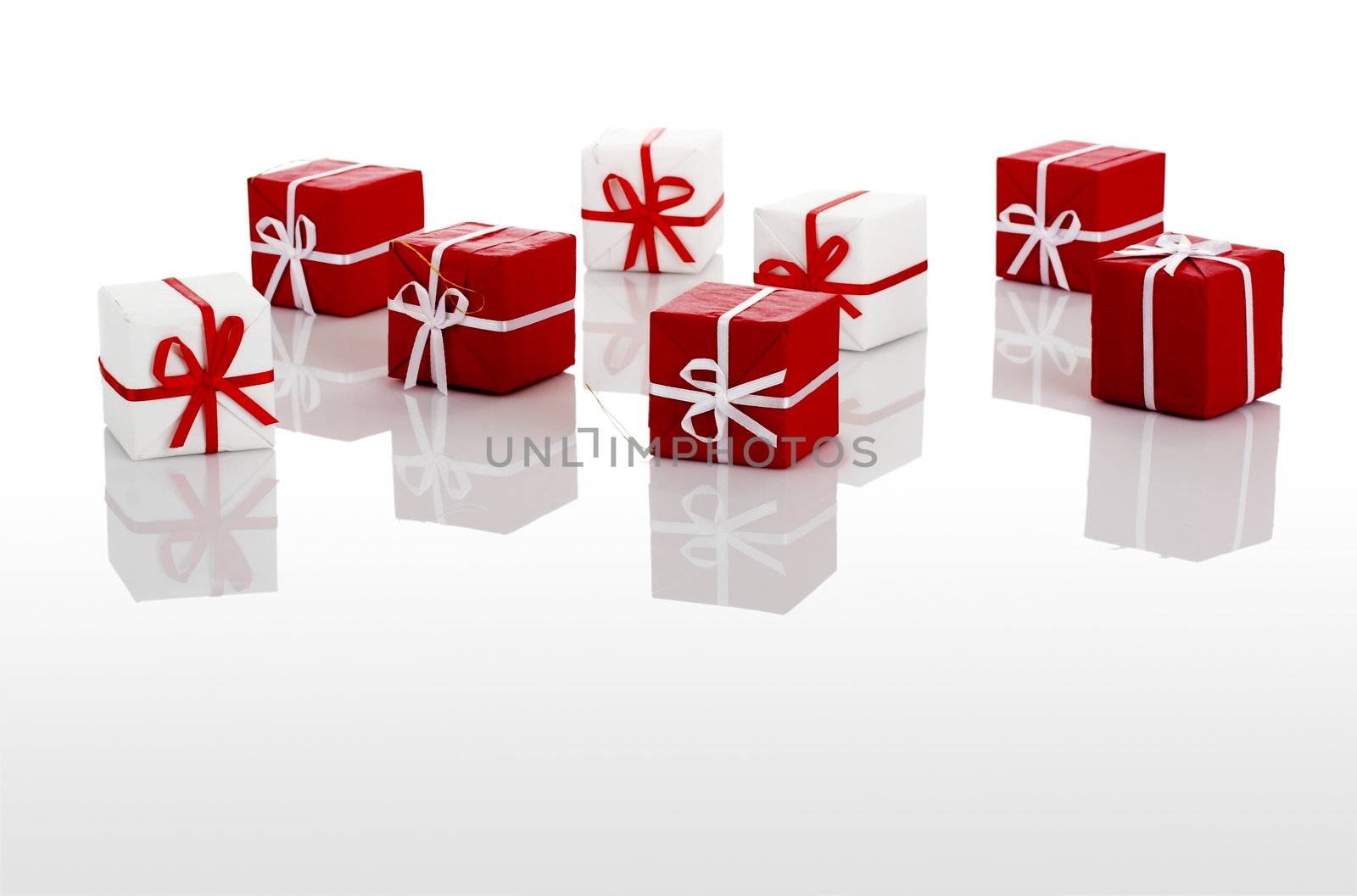 Christmas season! Small gift boxes with reflection