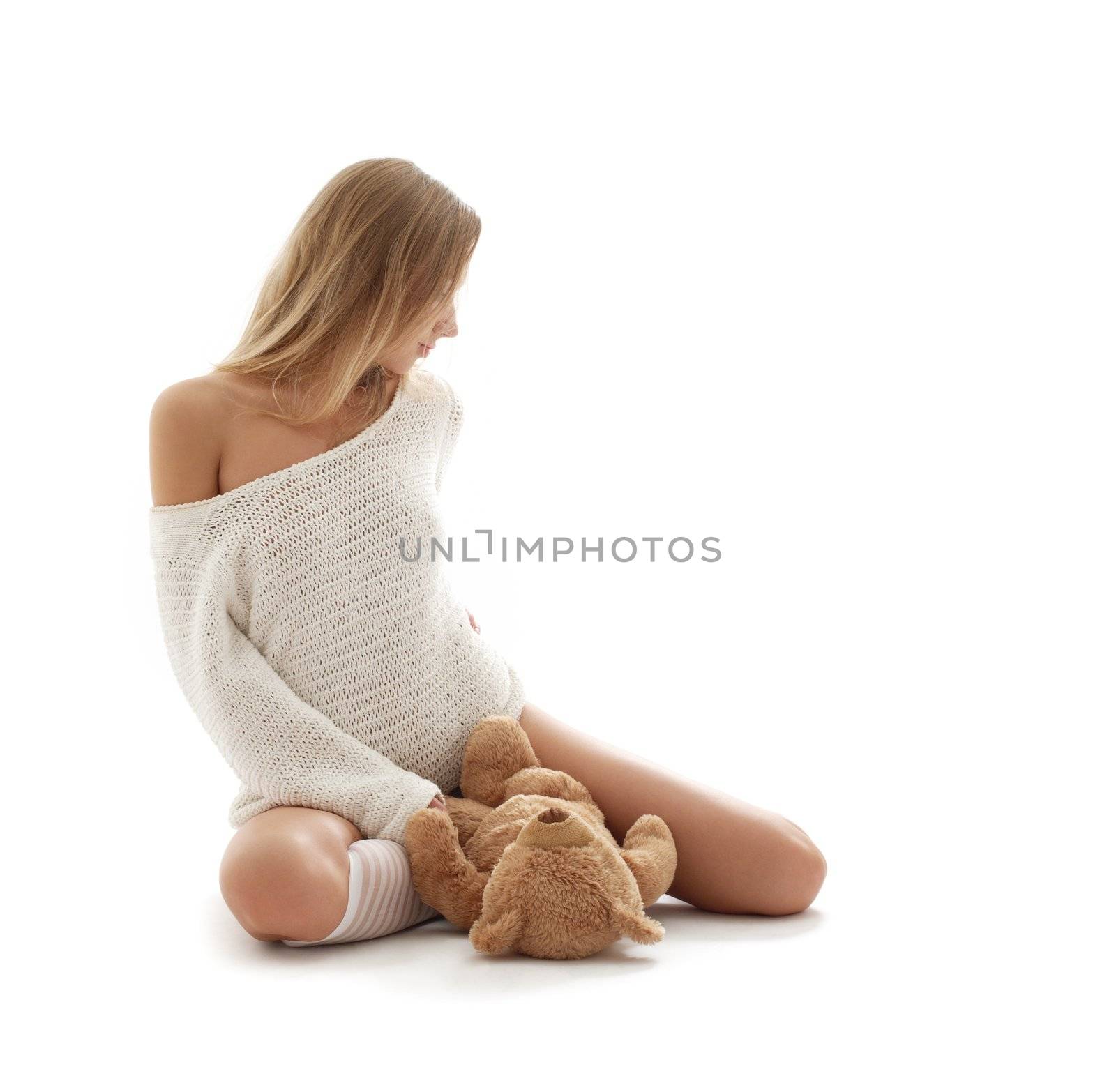 lovely blond in white sweater with teddy bear by dolgachov