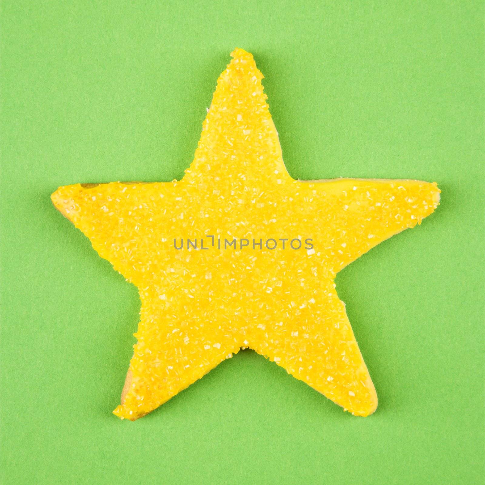 Star sugar cookie with decorative icing.