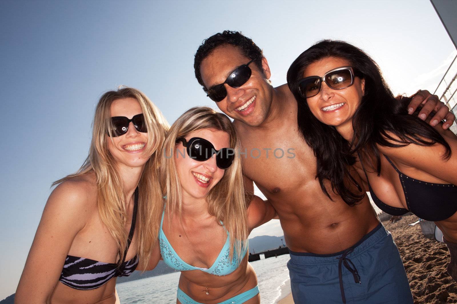 A group of friends having fun on the beach