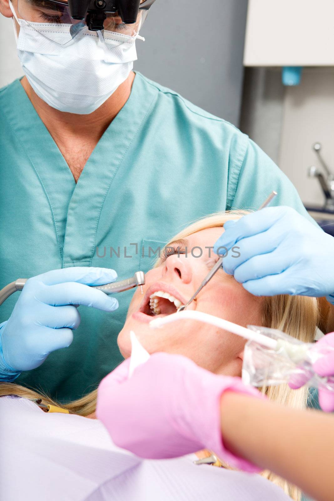 Dentist Drilling Tooth by leaf