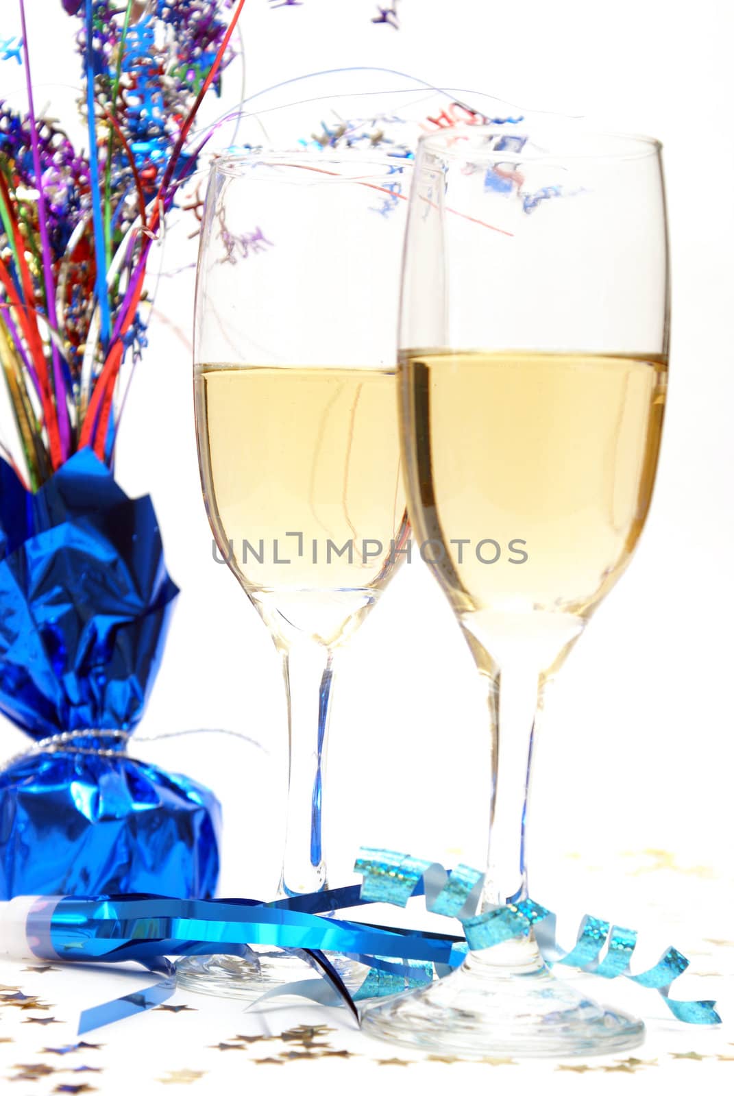 Two glasses of champagne on a white background.