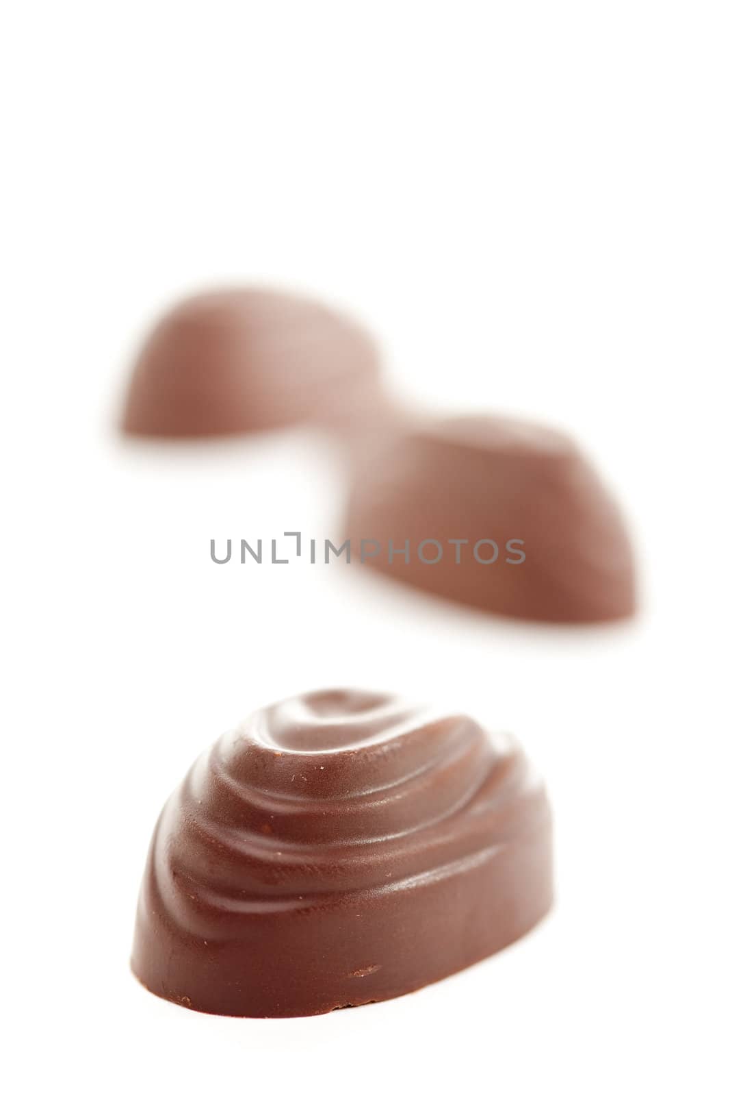 Delicious Chocolates Isolated on a White Background.
