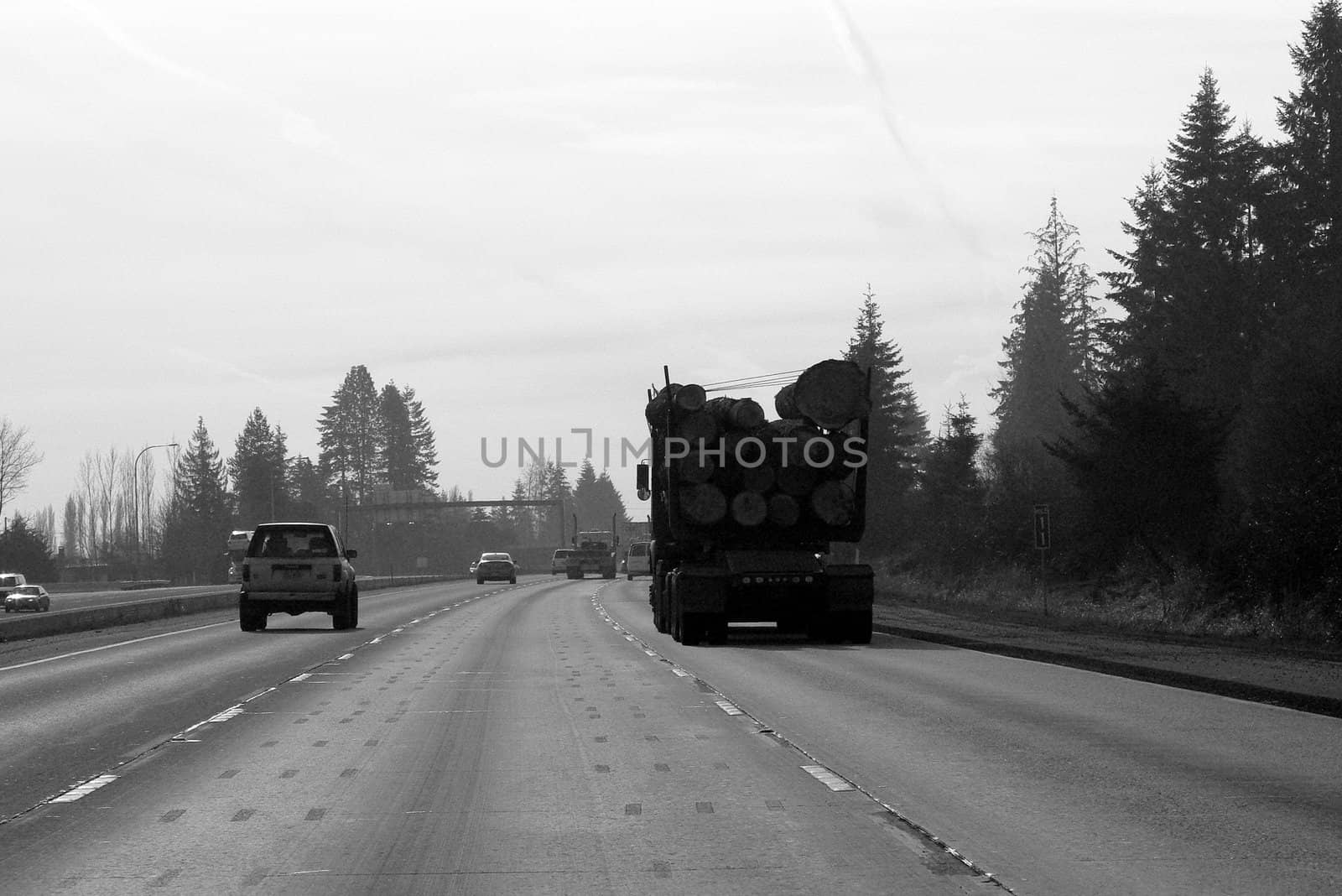 Hauling logs on freeway in Oregon