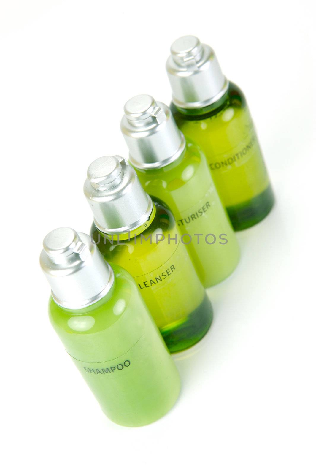 Hair and body products isolated against a white background