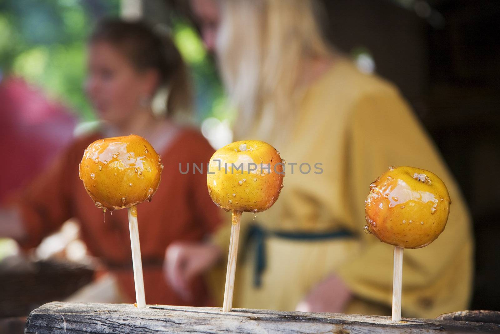 Apples with hot syrup served at Medieval Fest Turku, Finland, 