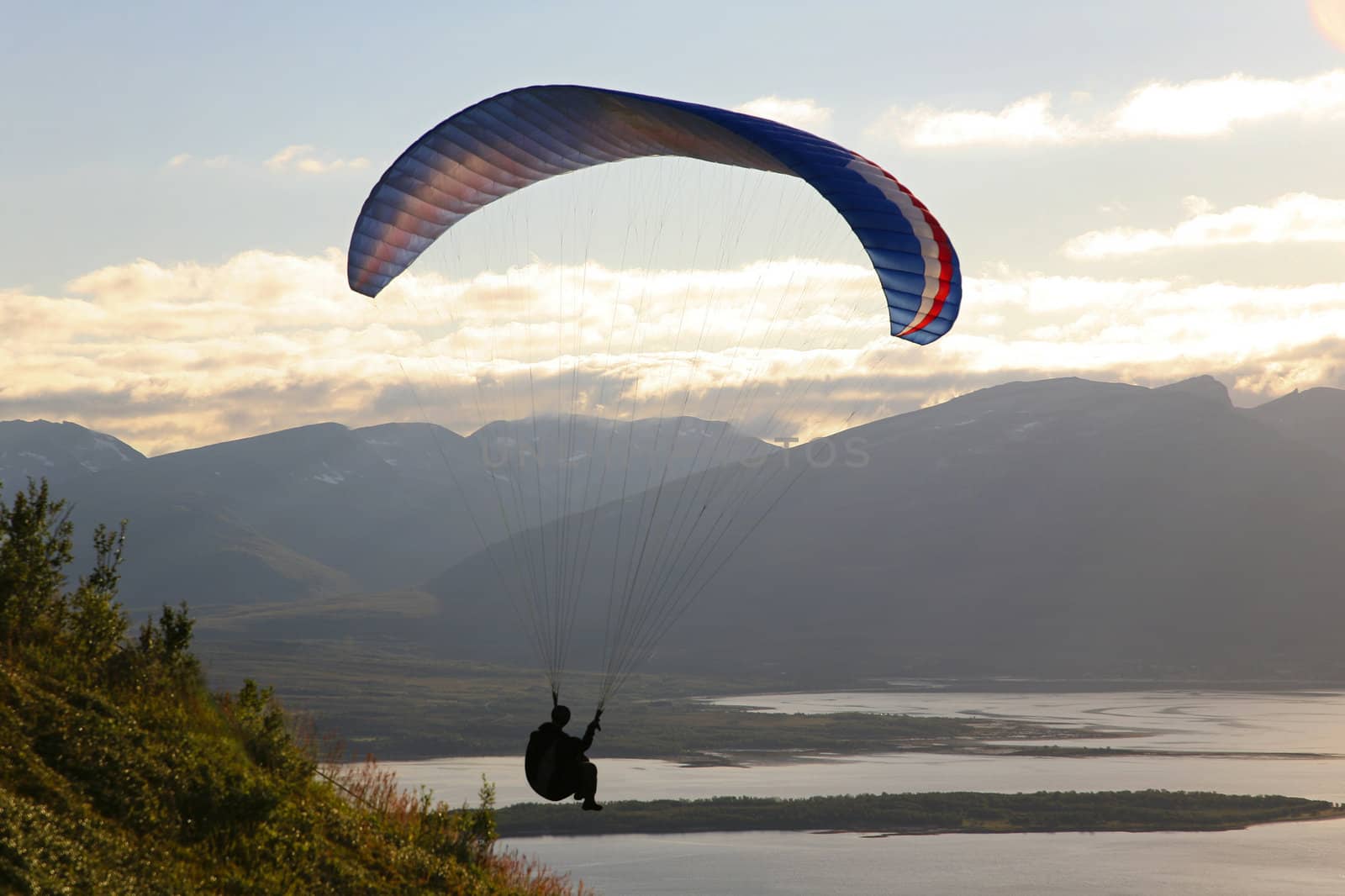 Paragliding in Norwegian mountains, Tromso, northernmost city in the world.