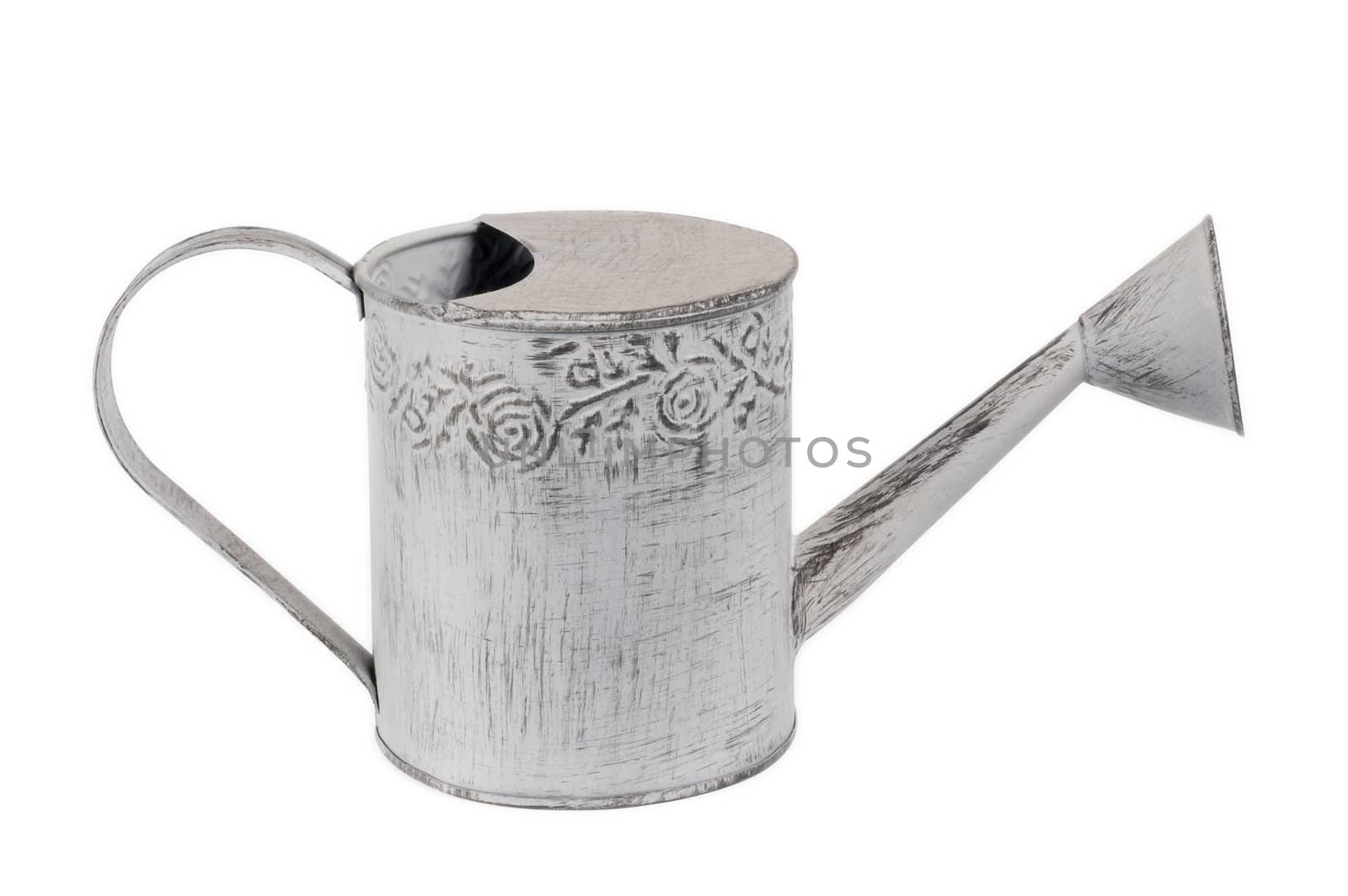 Vintage watering can on white