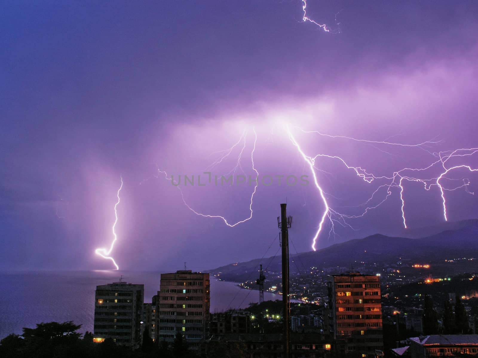 Night thunderstorm in a town