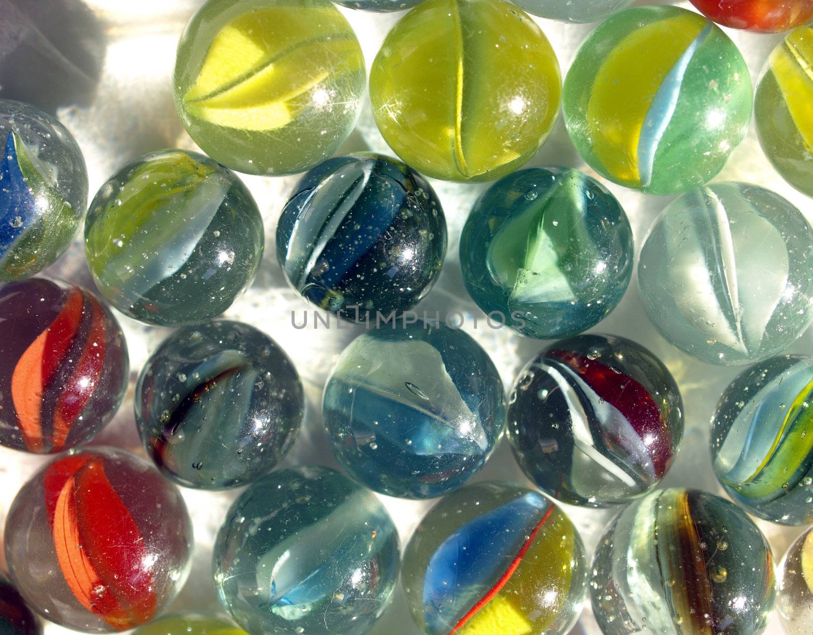 Coloured glass marble spheres toy background pattern