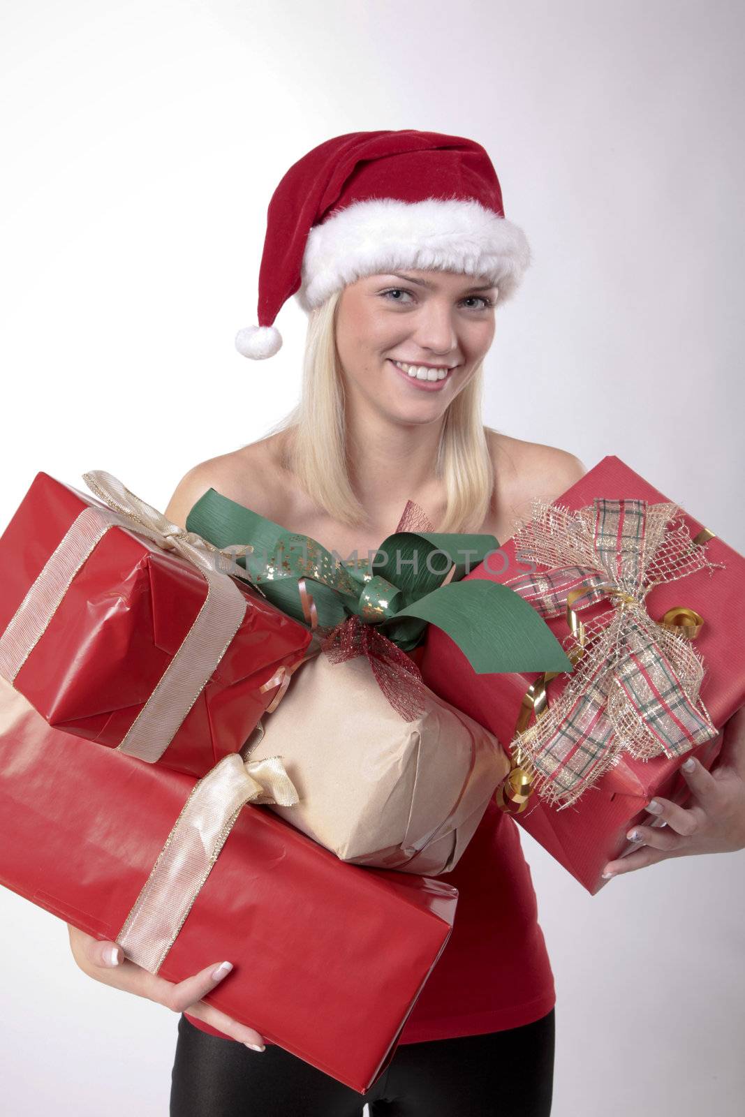 Blond Santa Girl Holding A Lot Of Christmas Presents