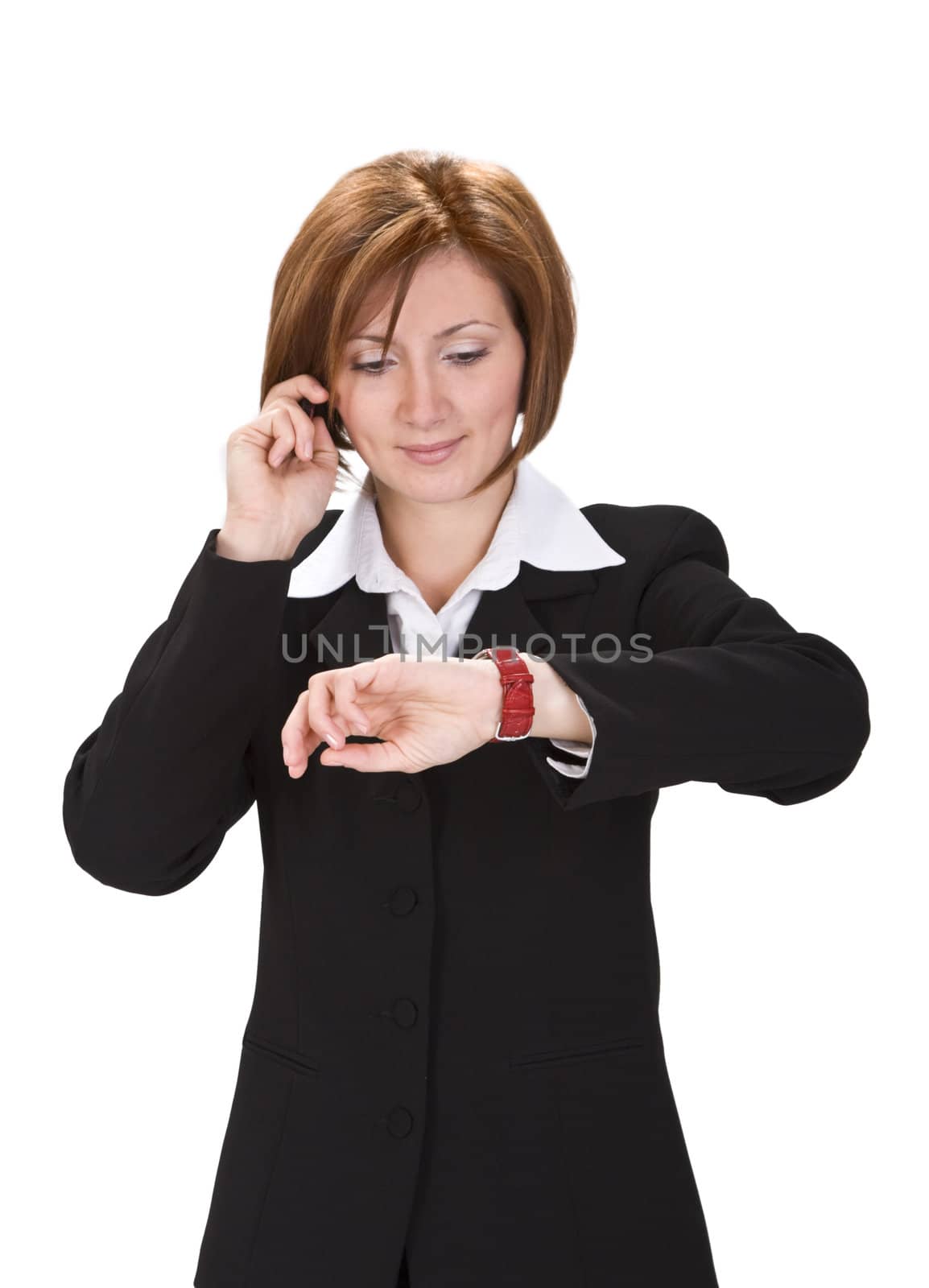 Busy businesswoman checking the time while calling. 