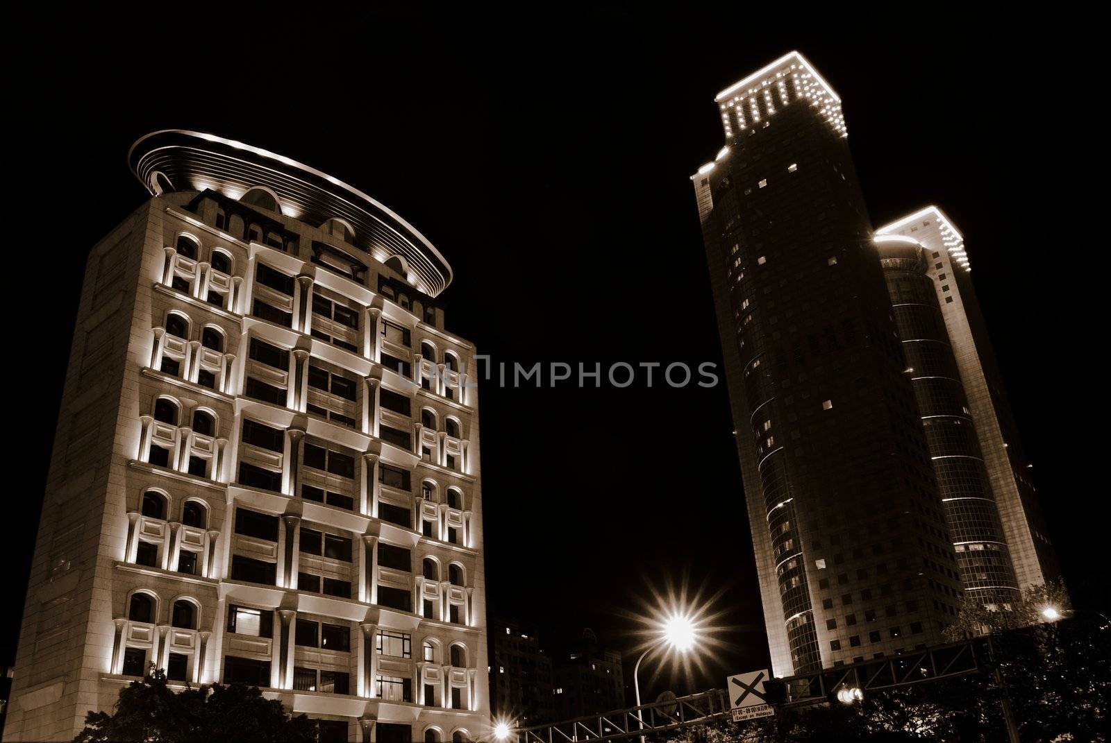 Night Scenes Of Skyscraper And Apartment by elwynn