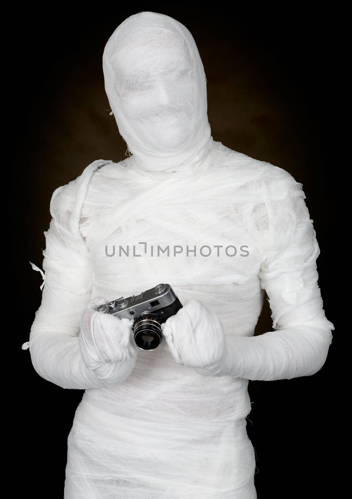 Mummy with retro camera by pzaxe