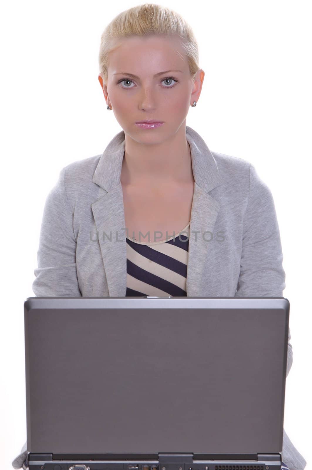 Beauty woman sits with a laptop